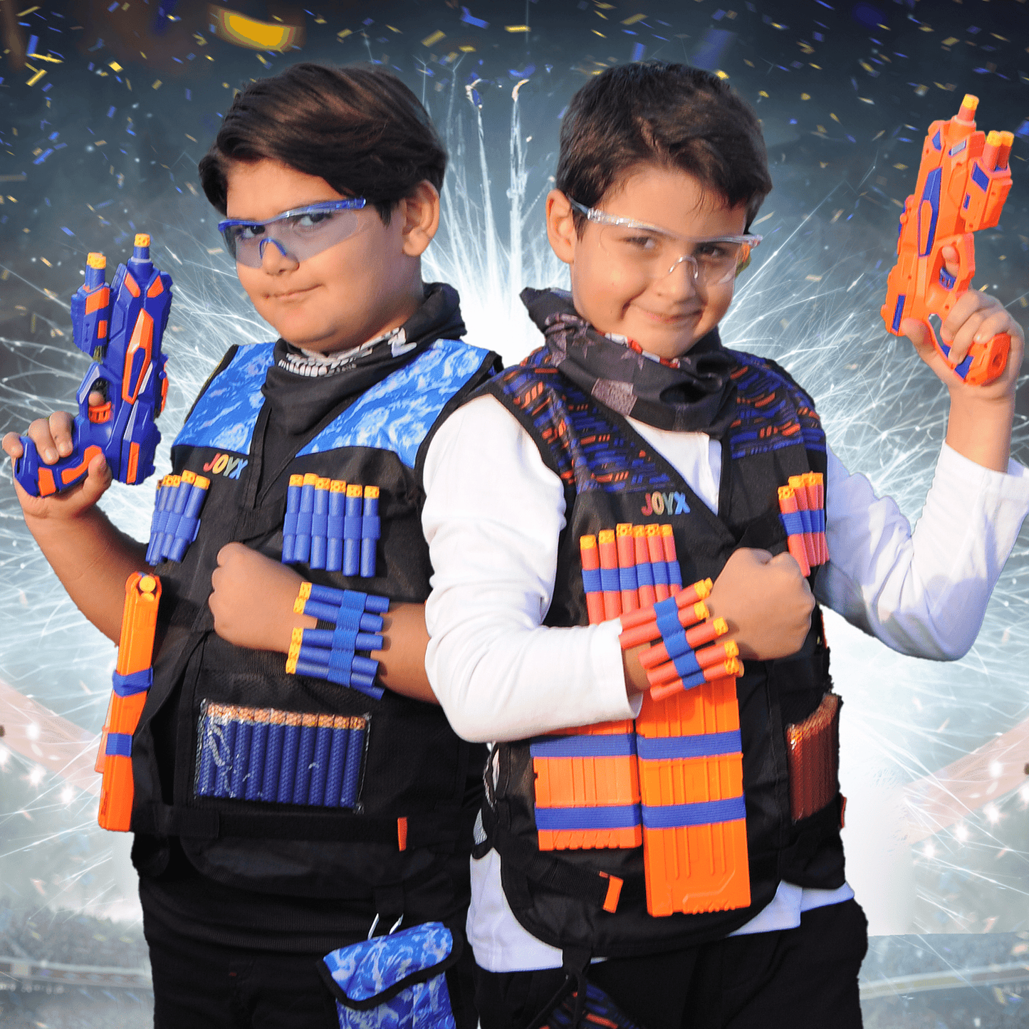 Children smiling and posing with JoyX blaster guns and loaded tactical vests, ready for play, with a dynamic energy burst background.
